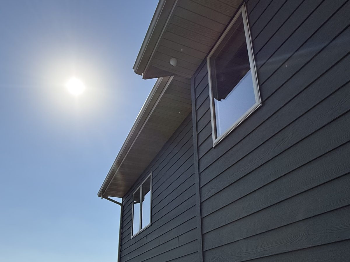 Dome camera tucked under the eave of a two-story home in Sioux Falls, SD